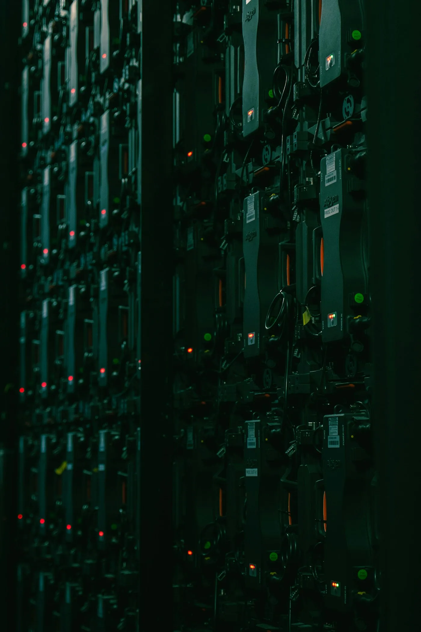 Rows of installed server equipment in a controlled facility